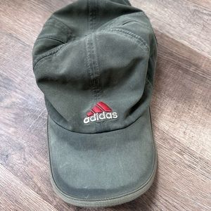 Green Adidas well-worn baseball cap
